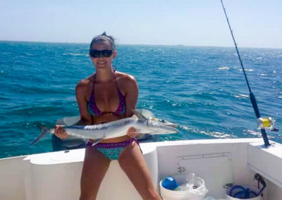 Olivia with her first Kingfish.