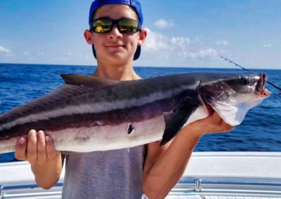 Boy with cobia